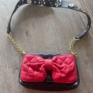 Betsey Johnson quilted black bag with red bow and flowered strap